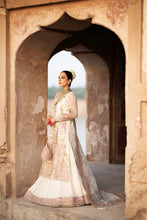 Load image into Gallery viewer, Drape yourself in the exquisite elegance of Dove, a masterpiece of timeless luxury. This opulent ensemble features a meticulously Resham embroidered and hand-embellished organza front, enriched with fine artistry on its right and left panels. The sleeves, adorned with intricate Resham and sequins embroidery, add a touch of regal grace, while matching motifs elevate the look with unparalleled sophistication. The back echoes the front&#39;s refined details, harmoniously paired with a 144-inch embroidered border t