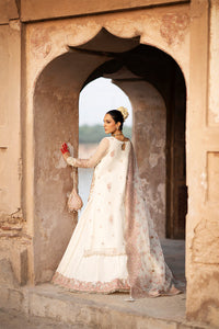 Drape yourself in the exquisite elegance of Dove, a masterpiece of timeless luxury. This opulent ensemble features a meticulously Resham embroidered and hand-embellished organza front, enriched with fine artistry on its right and left panels. The sleeves, adorned with intricate Resham and sequins embroidery, add a touch of regal grace, while matching motifs elevate the look with unparalleled sophistication. The back echoes the front's refined details, harmoniously paired with a 144-inch embroidered border t