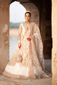 Drape yourself in the exquisite elegance of Dove, a masterpiece of timeless luxury. This opulent ensemble features a meticulously Resham embroidered and hand-embellished organza front, enriched with fine artistry on its right and left panels. The sleeves, adorned with intricate Resham and sequins embroidery, add a touch of regal grace, while matching motifs elevate the look with unparalleled sophistication. The back echoes the front's refined details, harmoniously paired with a 144-inch embroidered border t